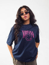 female model wearing blue nirvana oversized graphic t shirt showing the front side of the t shirt