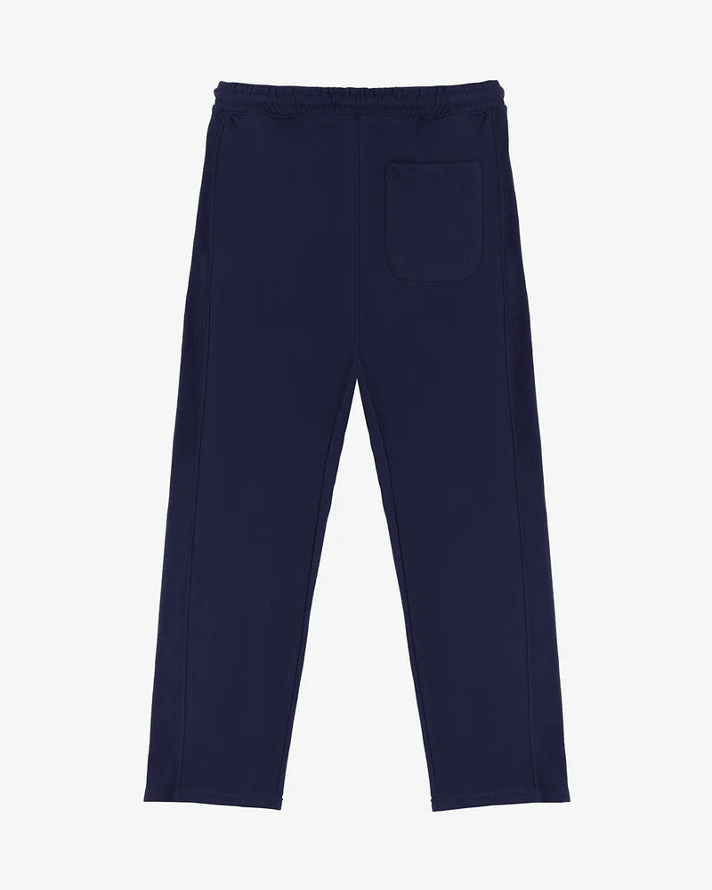 showing back side of navy blue straight pleated trouser