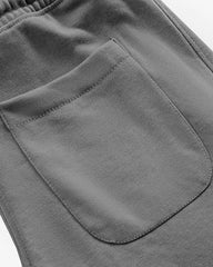 Close-up of gray cargo trouser with a pocket