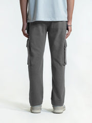 Person wearing gray cargo trouser on a white background