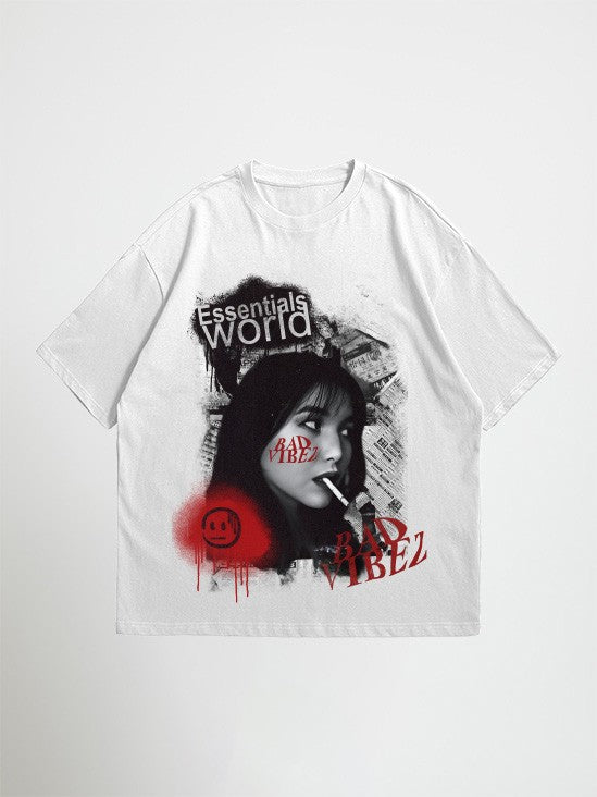White essentials world oversized graphic t-shirt with graphic design featuring a person and text on a white background