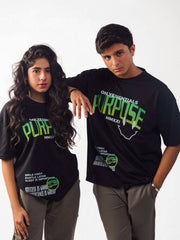 male and female model wearing black essentials purpose oversized graphic t shirt showing the front of the t shirt