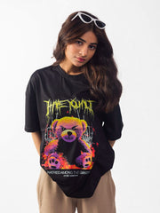 female model wearing black hate you all oversized graphic t shirt showing the front of the t shirt