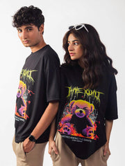 female and male model wearing black hate you all oversized graphic t shirt showing the front and side view of the t shirt