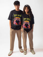 female and male model wearing black hate you all oversized graphic t shirt showing the front of the t shirt while standing