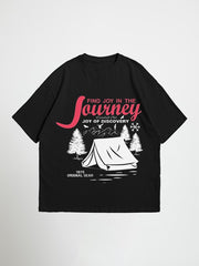 Black joy in the journey oversized graphic t-shirt with a graphic design featuring a tent and text on a white background