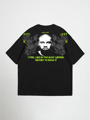 Black kanye west oversized graphic t-shirt with graphic design and text on a white background