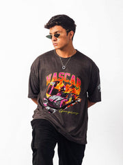 Male model wearing charcoal nascar oversized graphic t shirt showing the front view