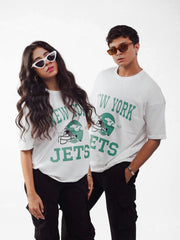 female and male model wearing white newyork jets oversized graphic t shirt showing the front side of the t shirt while posing