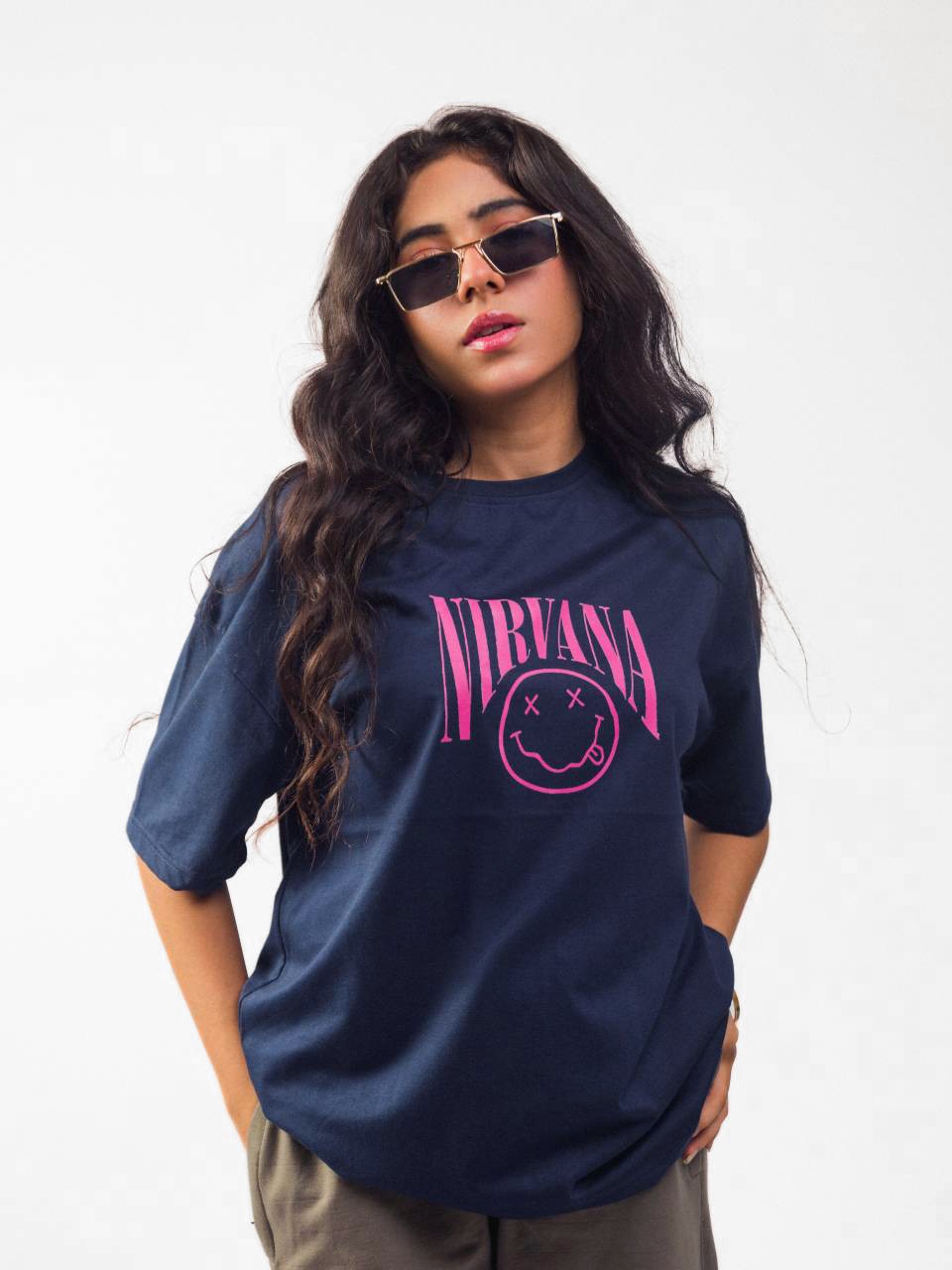female model wearing blue nirvana oversized graphic t shirt showing the front side of the t shirt