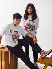 Male and Female model wearing Party King oversized white graphic t-shirt Female model showing front while male model showing right side Attire Essentials

