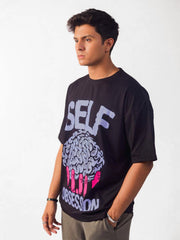 male model wearing black self obsession oversized graphic t shirt showing left side view
