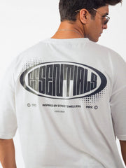 male model wearing white street dwellers oversized graphic t shirt showing the back side in detailed view