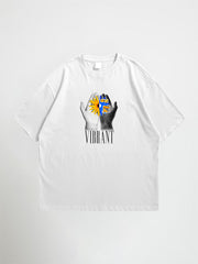 White vibrant oversized graphic t-shirt with a graphic design of hands holding a sun and the word 'Vibrant' on a white background