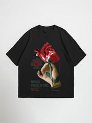 Black world peace oversized graphic t-shirt with a graphic of a hand holding a red rose on a white background